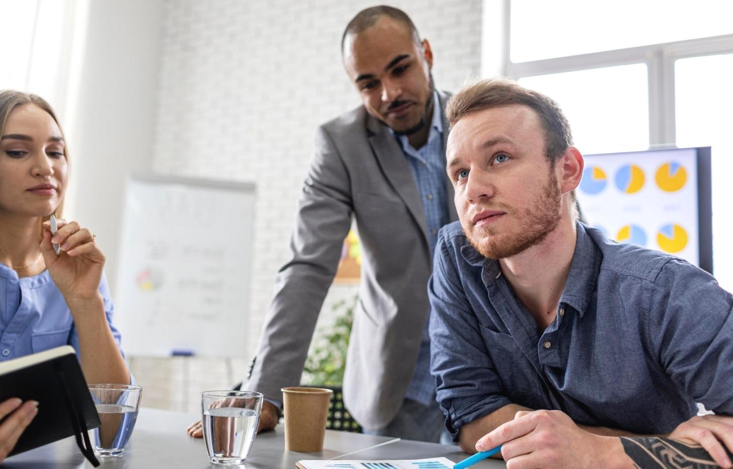 Business forecasting team collaborating on strategic planning