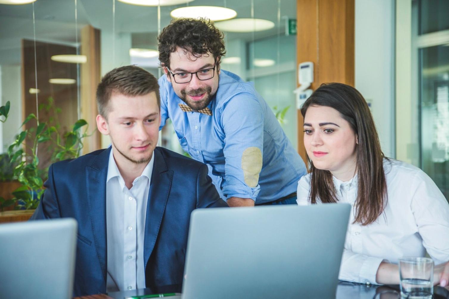 Professional business meeting discussing financial strategies and forecasting solutions